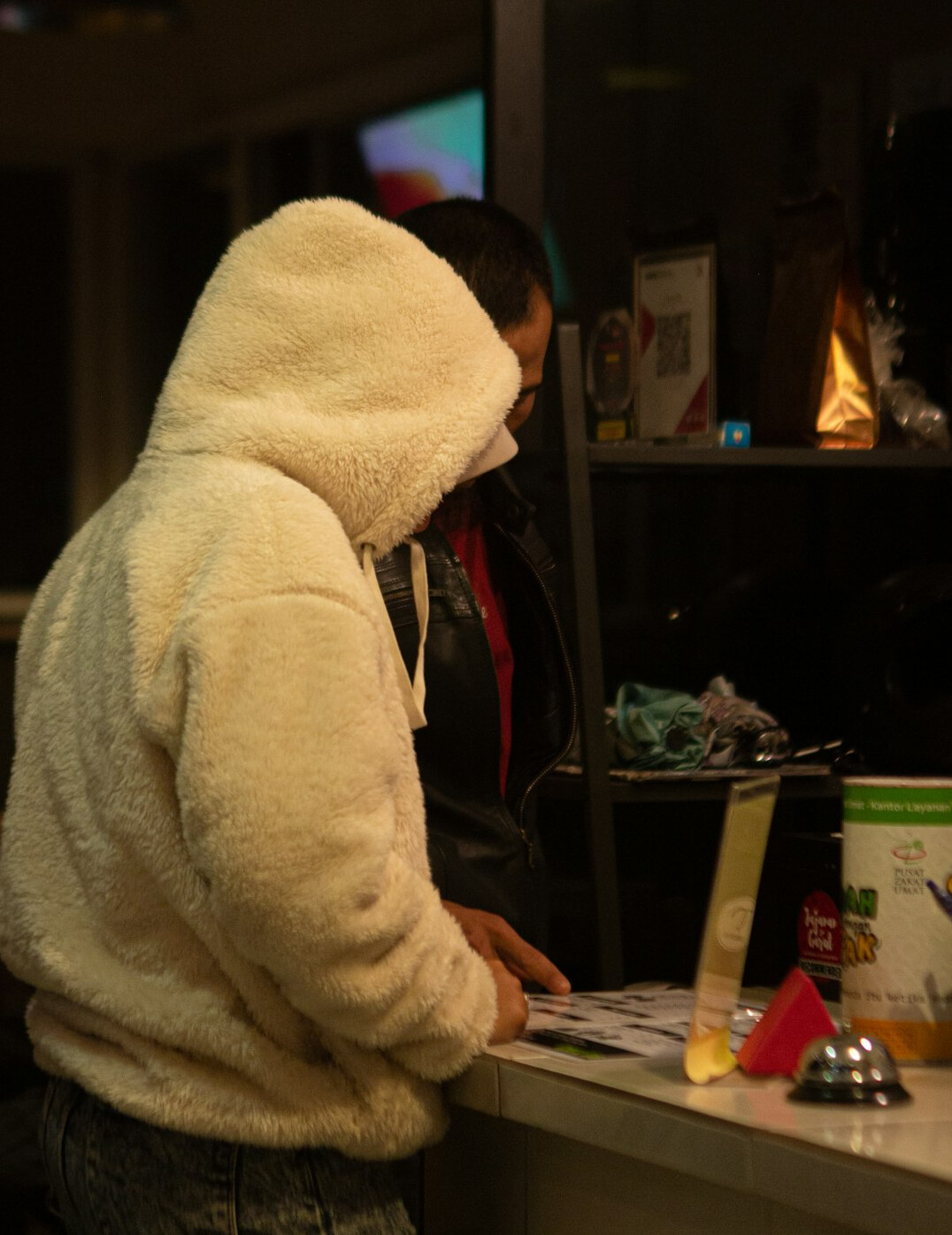 store detective monitoring suspects