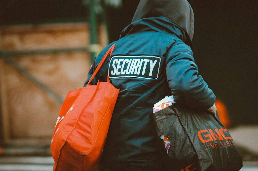 woman security officer in store
