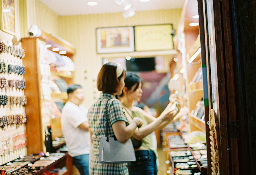 store detective observing shoppers