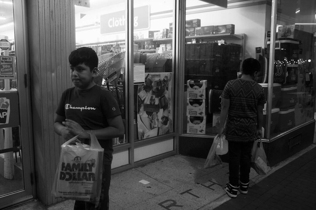 store detective watching shoppers