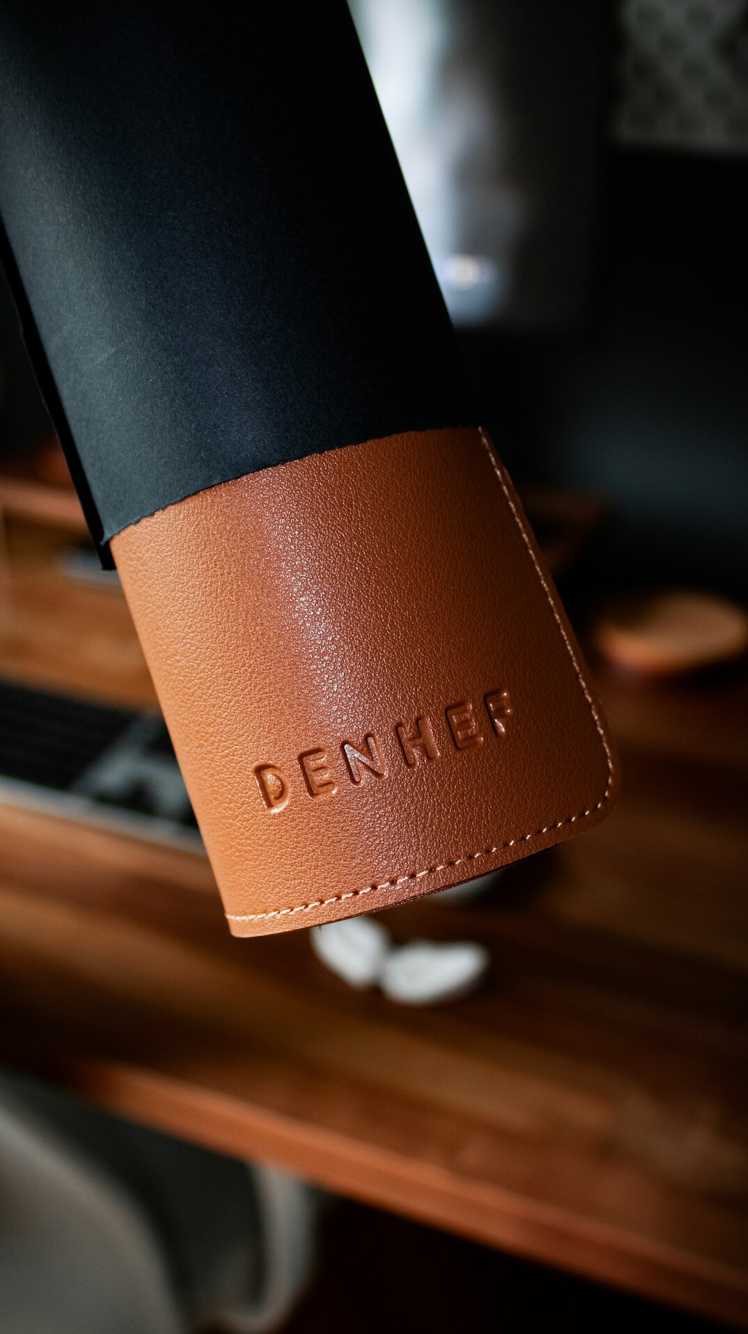 Open detective case file with pen and coffee cup on a desk