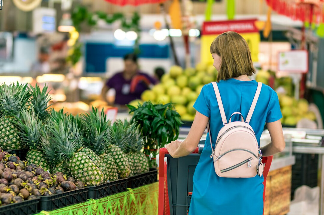 shoplifter with backpack in store